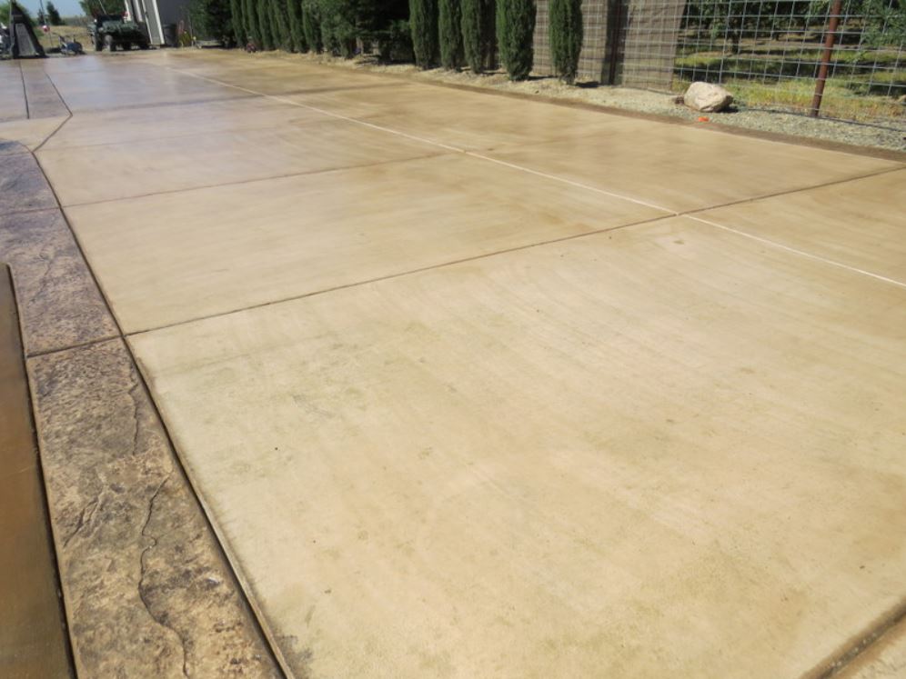this image shows concrete driveway in Moreno Valley, California